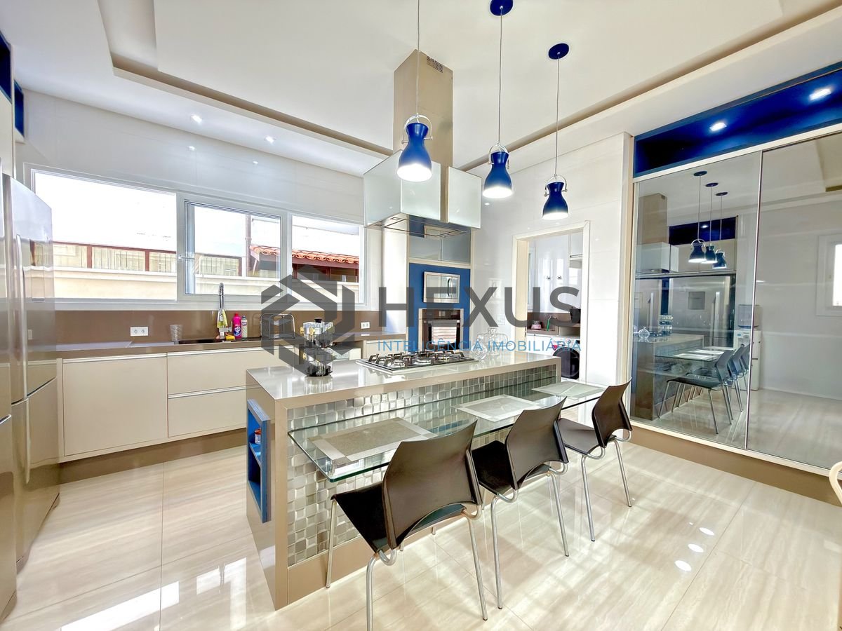 Foto 12 de Casa reformada com piscina e área gourmet no Jardim Acapulco, Guarujá