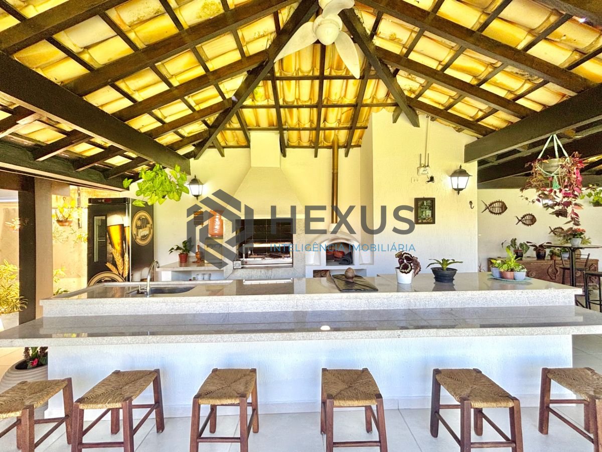 Foto 17 de Casa reformada com piscina e área gourmet no Jardim Acapulco, Guarujá