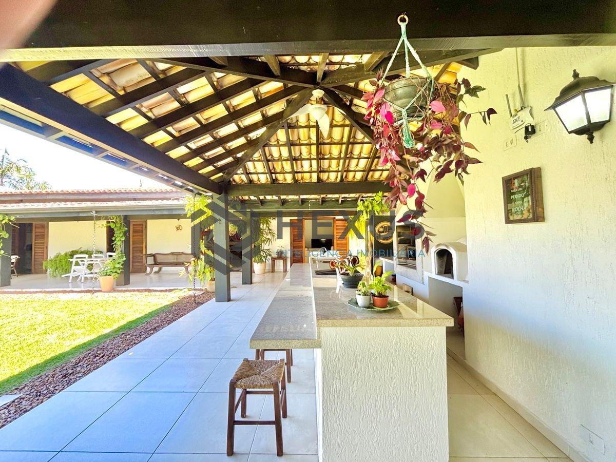 Foto 18 de Casa reformada com piscina e área gourmet no Jardim Acapulco, Guarujá