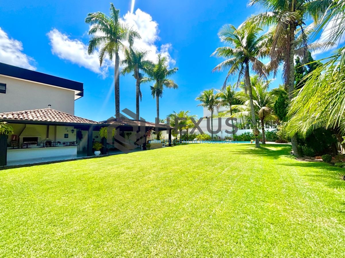 Foto 10 de Casa reformada com piscina e área gourmet no Jardim Acapulco, Guarujá