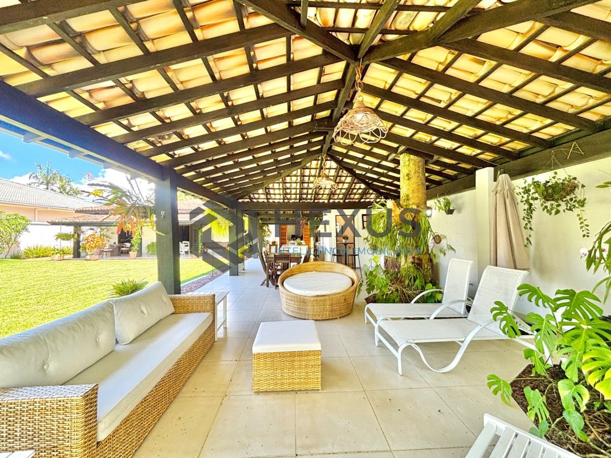 Foto 2 de Casa reformada com piscina e área gourmet no Jardim Acapulco, Guarujá