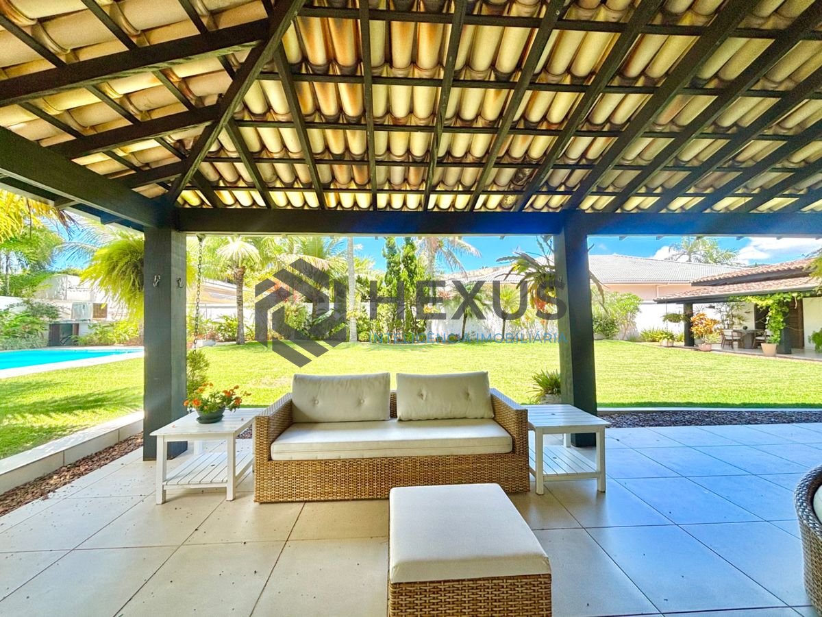 Foto 7 de Casa reformada com piscina e área gourmet no Jardim Acapulco, Guarujá
