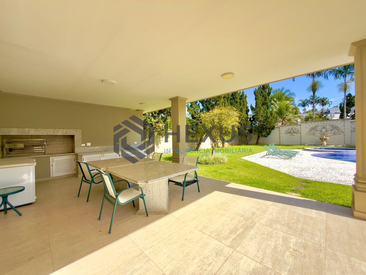 Foto 5 de Casa de alto padrão com piscina e área gourmet no Jardim Acapulco, Guarujá