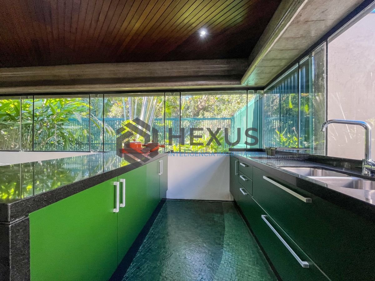 Foto 31 de Casa térrea moderna com piscina e jardim, no Balneário Pernambuco, Guarujá
