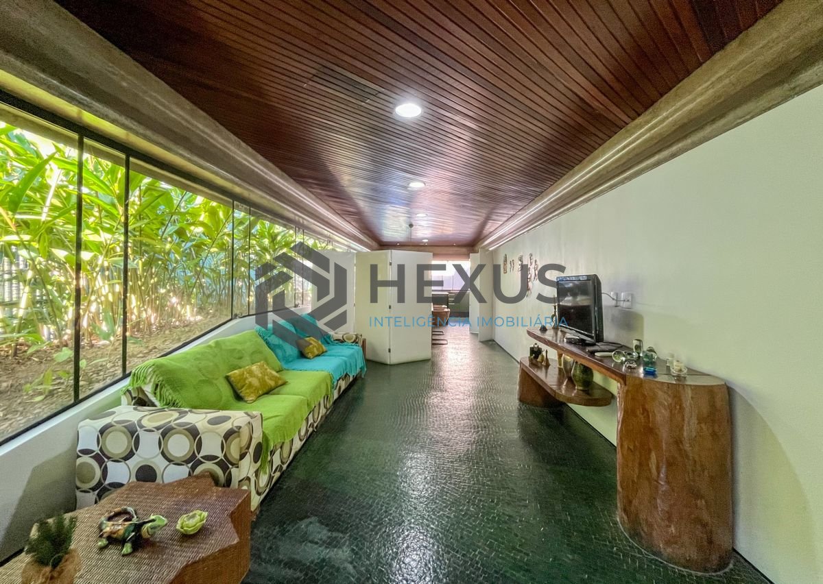 Foto 7 de Casa térrea moderna com piscina e jardim, no Balneário Pernambuco, Guarujá