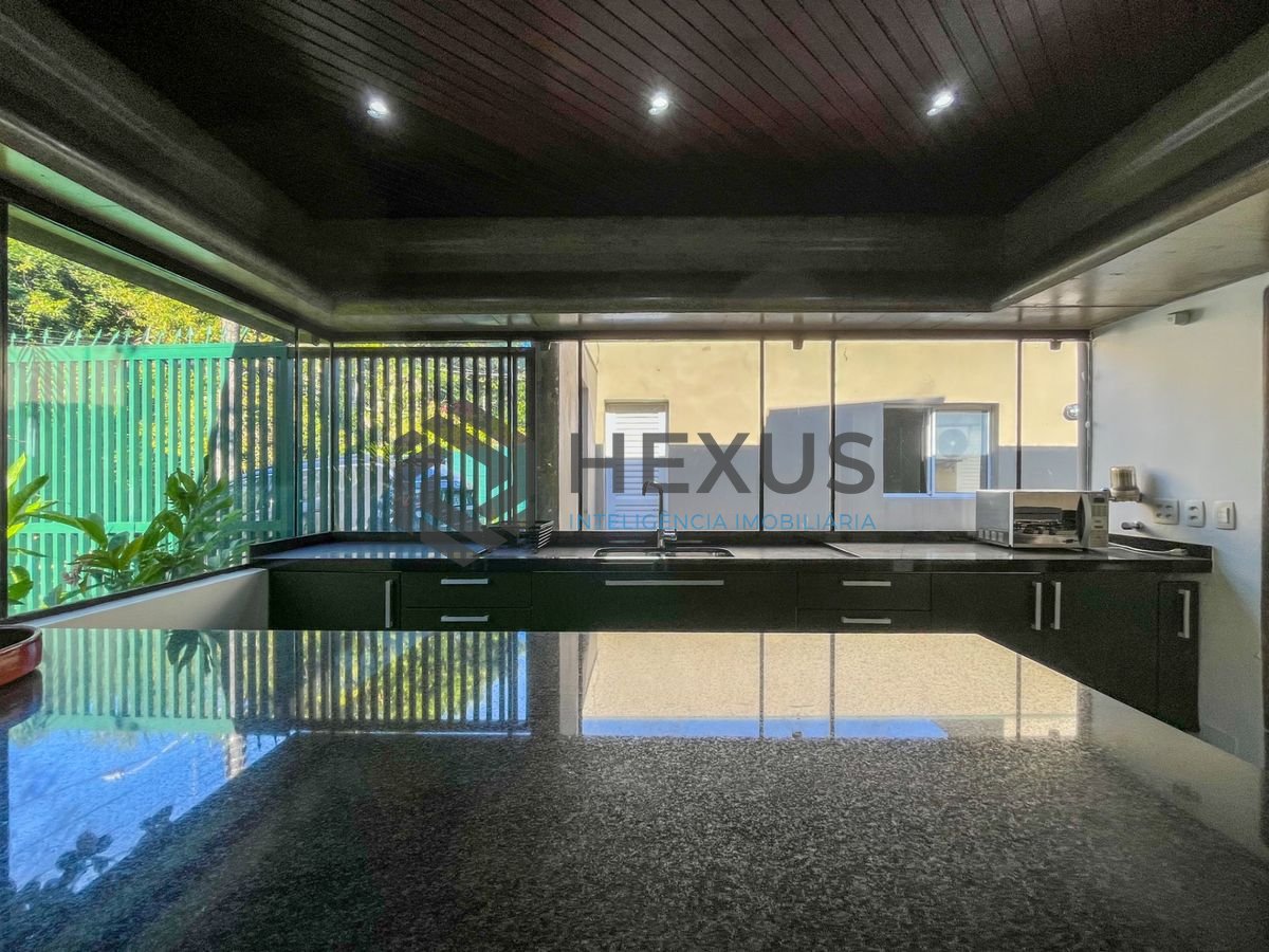 Foto 30 de Casa térrea moderna com piscina e jardim, no Balneário Pernambuco, Guarujá