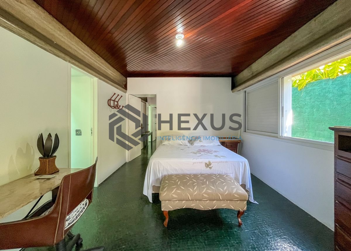 Foto 14 de Casa térrea moderna com piscina e jardim, no Balneário Pernambuco, Guarujá