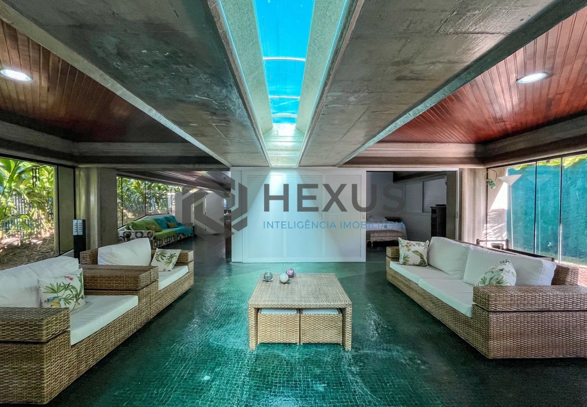 Foto 6 de Casa térrea moderna com piscina e jardim, no Balneário Pernambuco, Guarujá
