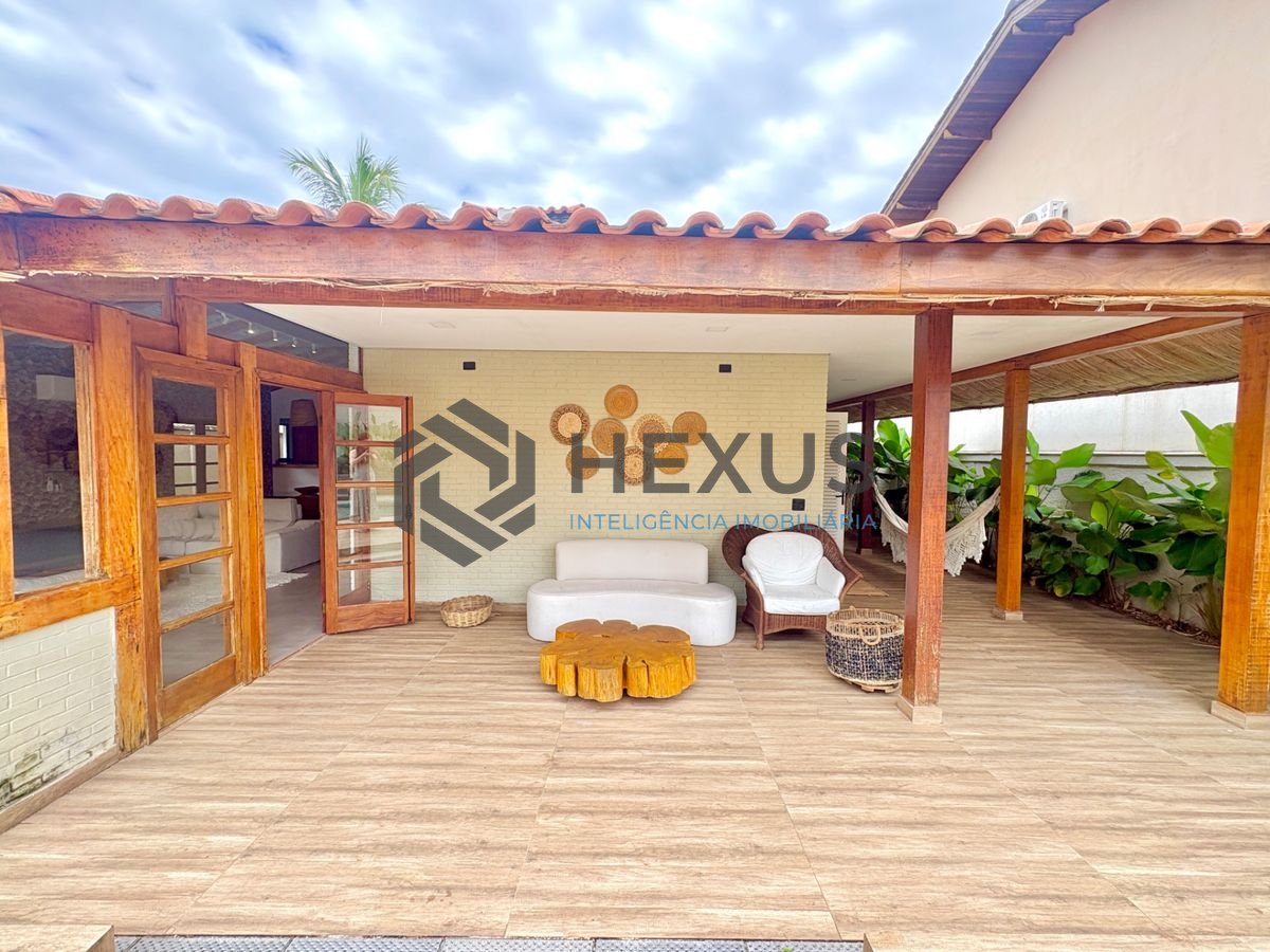 Foto 11 de Casa reformada com piscina e área gourmet no Jardim Acapulco, Guarujá