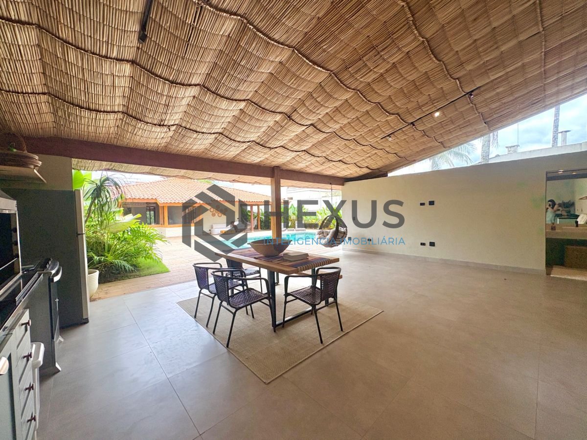 Foto 10 de Casa reformada com piscina e área gourmet no Jardim Acapulco, Guarujá