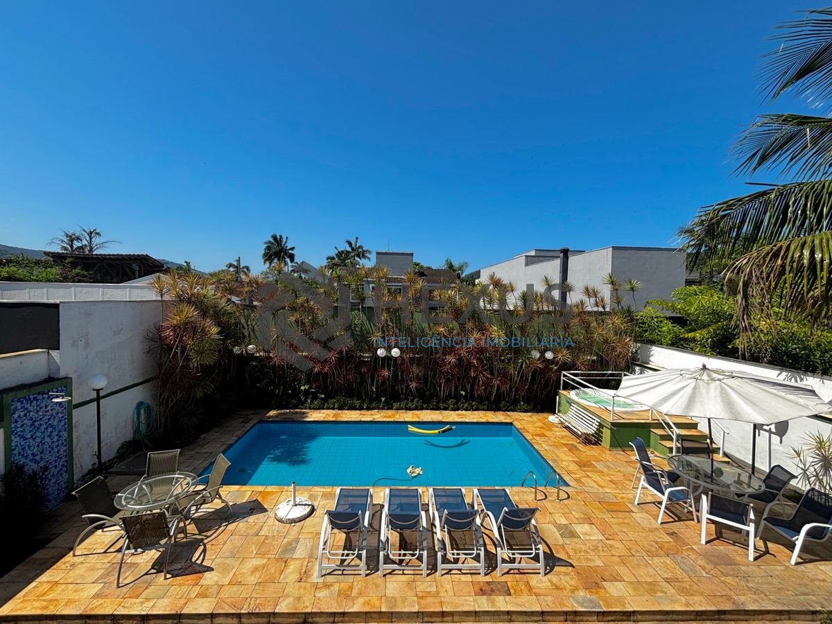 Foto 47 de Casa reformada com piscina e área gourmet no Jardim Acapulco, Guarujá