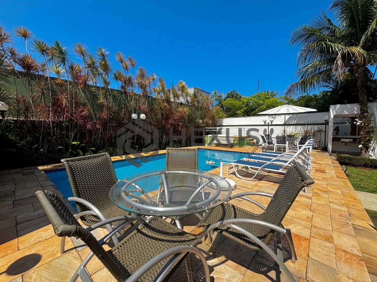 Foto 10 de Casa reformada com piscina e área gourmet no Jardim Acapulco, Guarujá