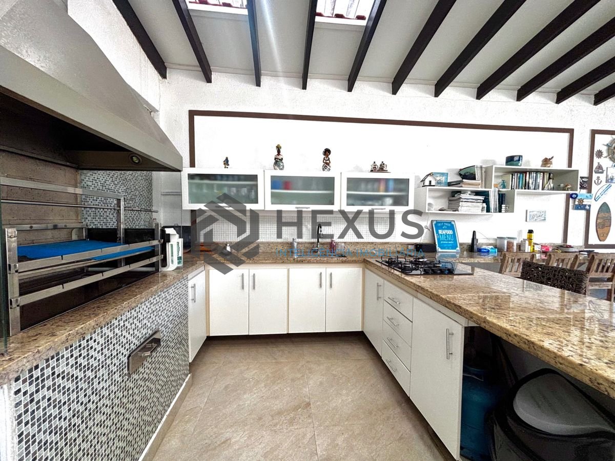 Foto 31 de Casa reformada com piscina e área gourmet no Jardim Acapulco, Guarujá