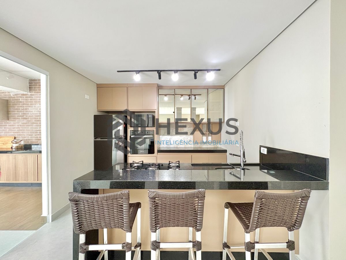Foto 14 de Casa reformada com piscina e área gourmet no Jardim Acapulco, Guarujá