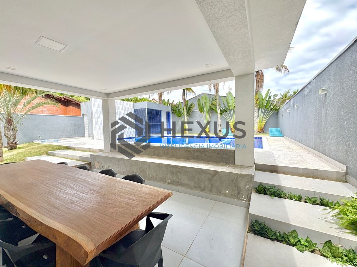 Foto 6 de Casa reformada com piscina e área gourmet no Jardim Acapulco, Guarujá