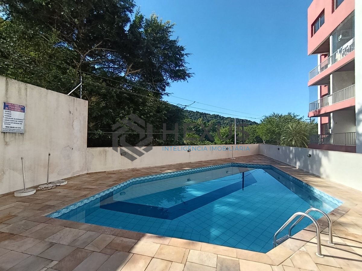 Foto 3 de Apartamento reformado com varanda e lazer a 300m da praia na região do Tortugas na Enseada, Guarujá