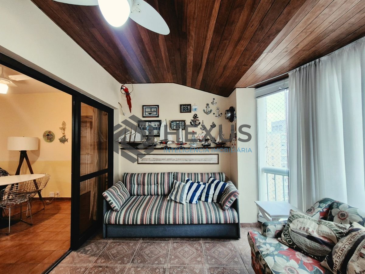 Foto 2 de Apartamento com varanda e lazer a 100m da praia na região do Maluf nas Pitangueiras, Guarujá