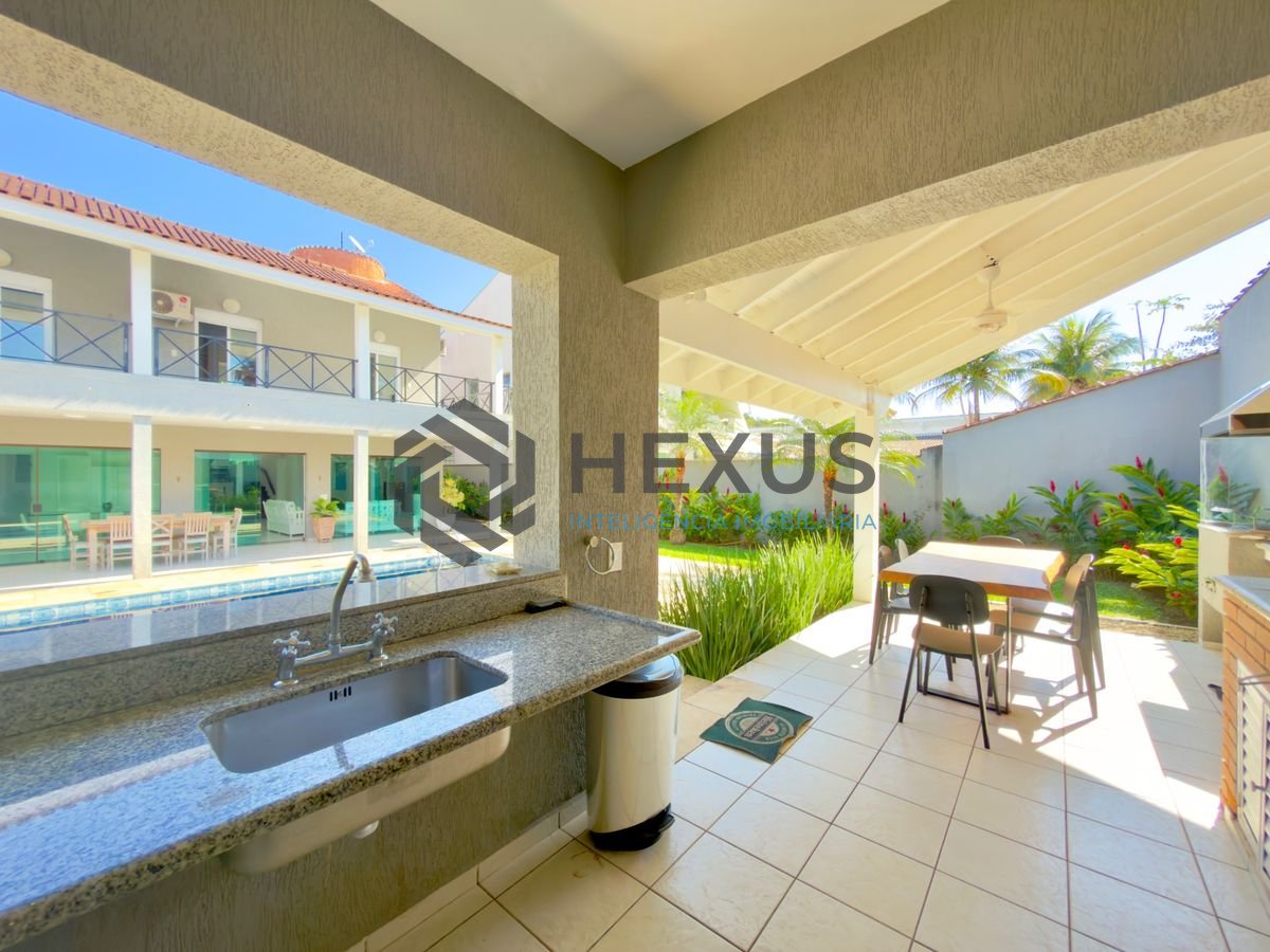 Foto 9 de Casa de alto padrão com piscina e área gourmet no Jardim Acapulco, Guarujá