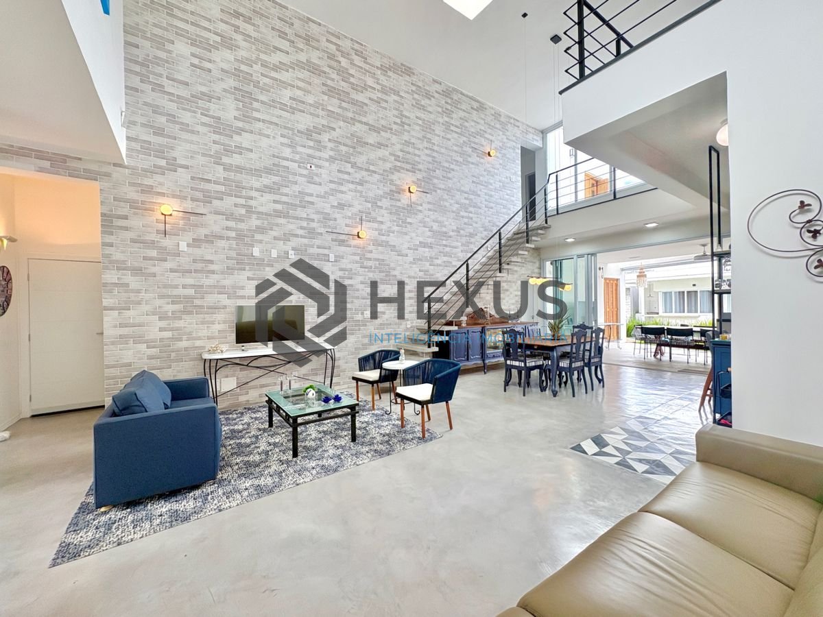 Foto 11 de Casa reformada com piscina e área gourmet no Jardim Acapulco, Guarujá