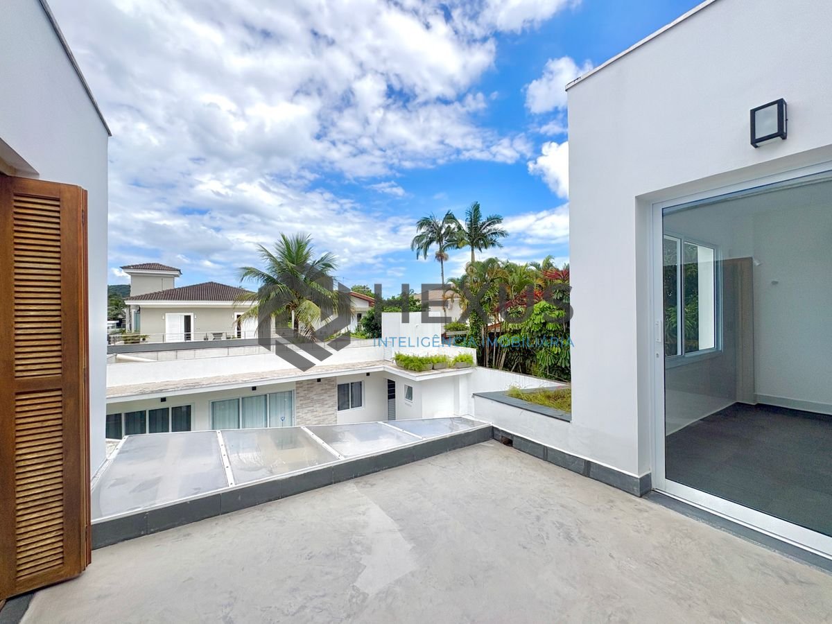 Foto 21 de Casa reformada com piscina e área gourmet no Jardim Acapulco, Guarujá