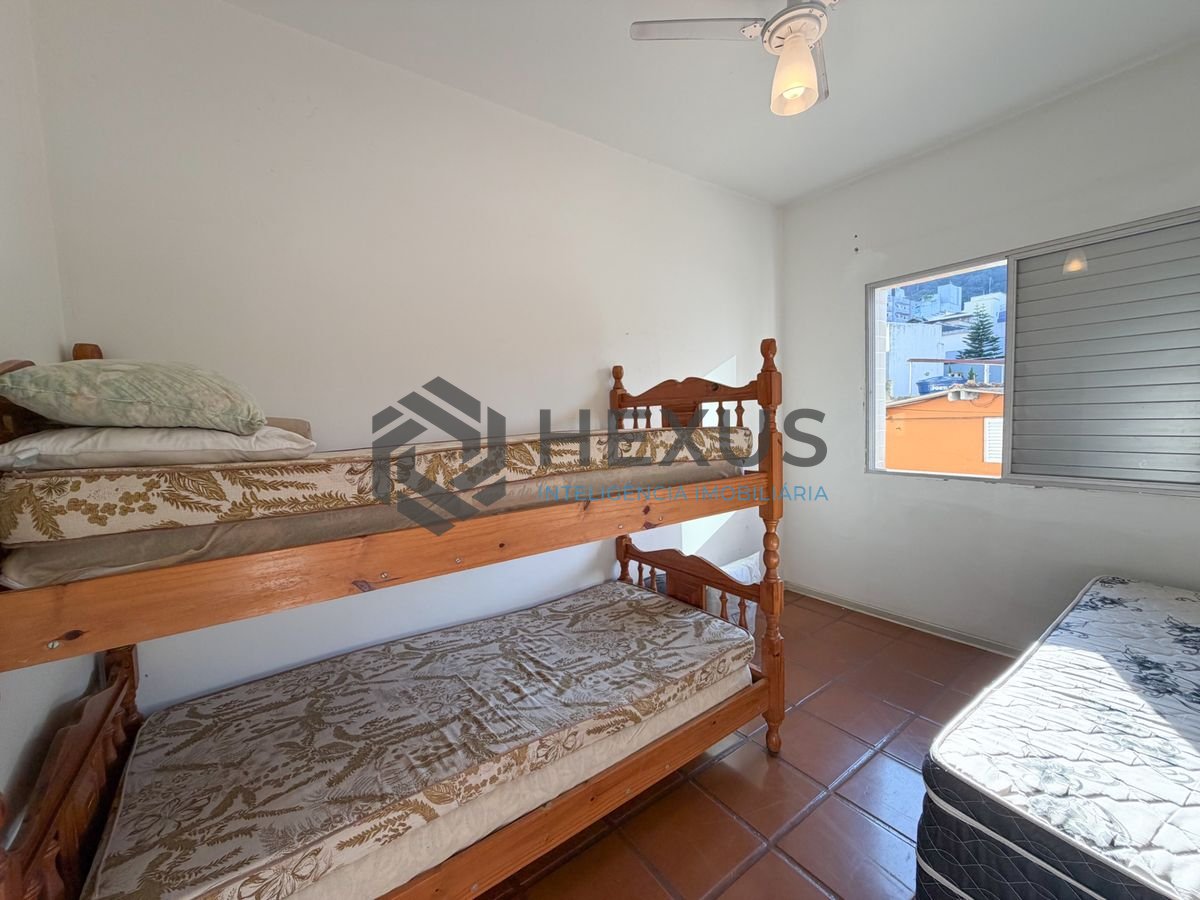 Foto 10 de Apartamento com varanda a 500m da praia na região da Vila Julia na Enseada, Guarujá