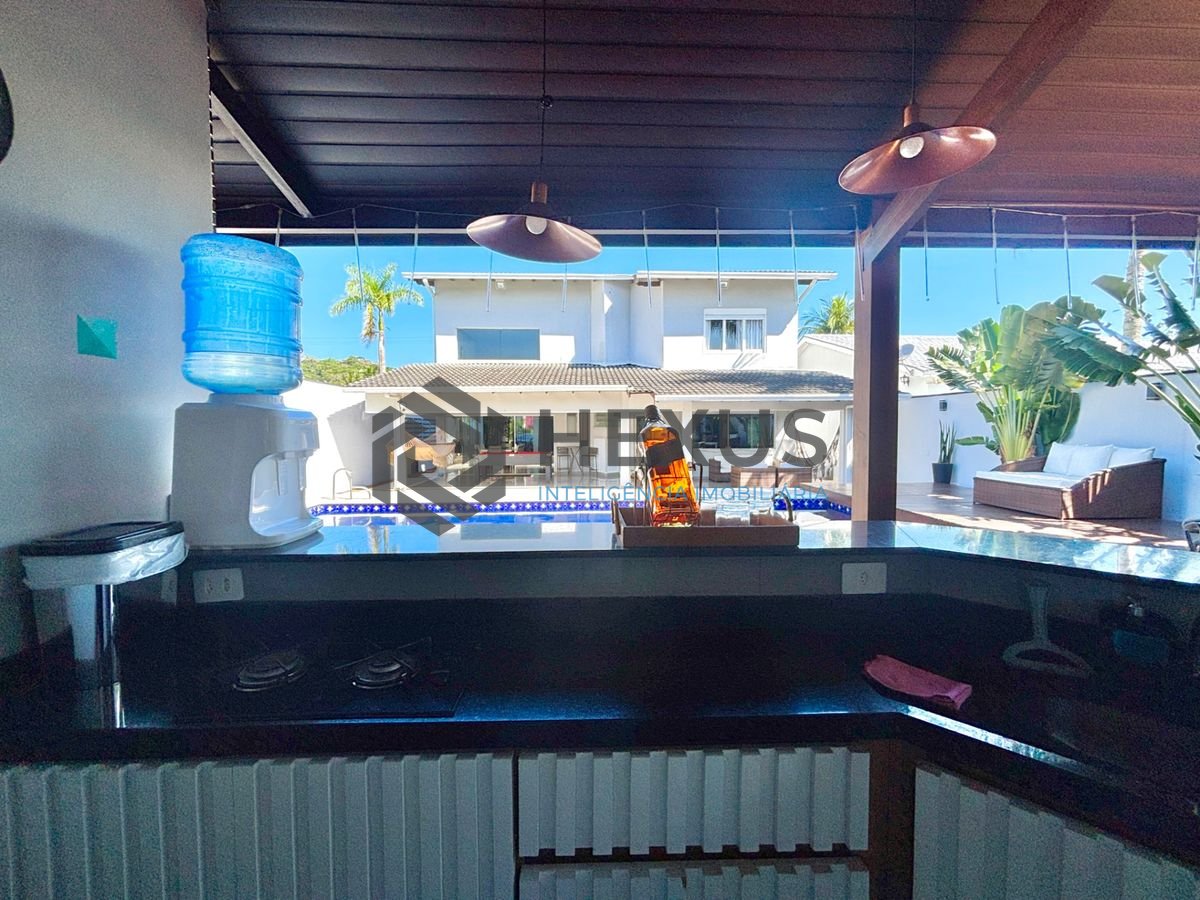 Foto 12 de Casa reformada com piscina e área gourmet no Jardim Acapulco, Guarujá