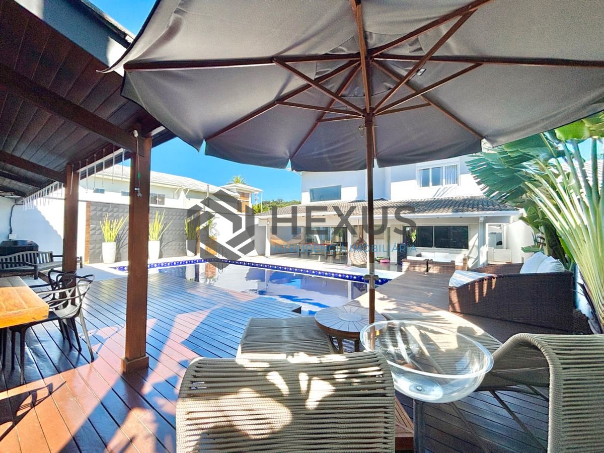 Foto 15 de Casa reformada com piscina e área gourmet no Jardim Acapulco, Guarujá