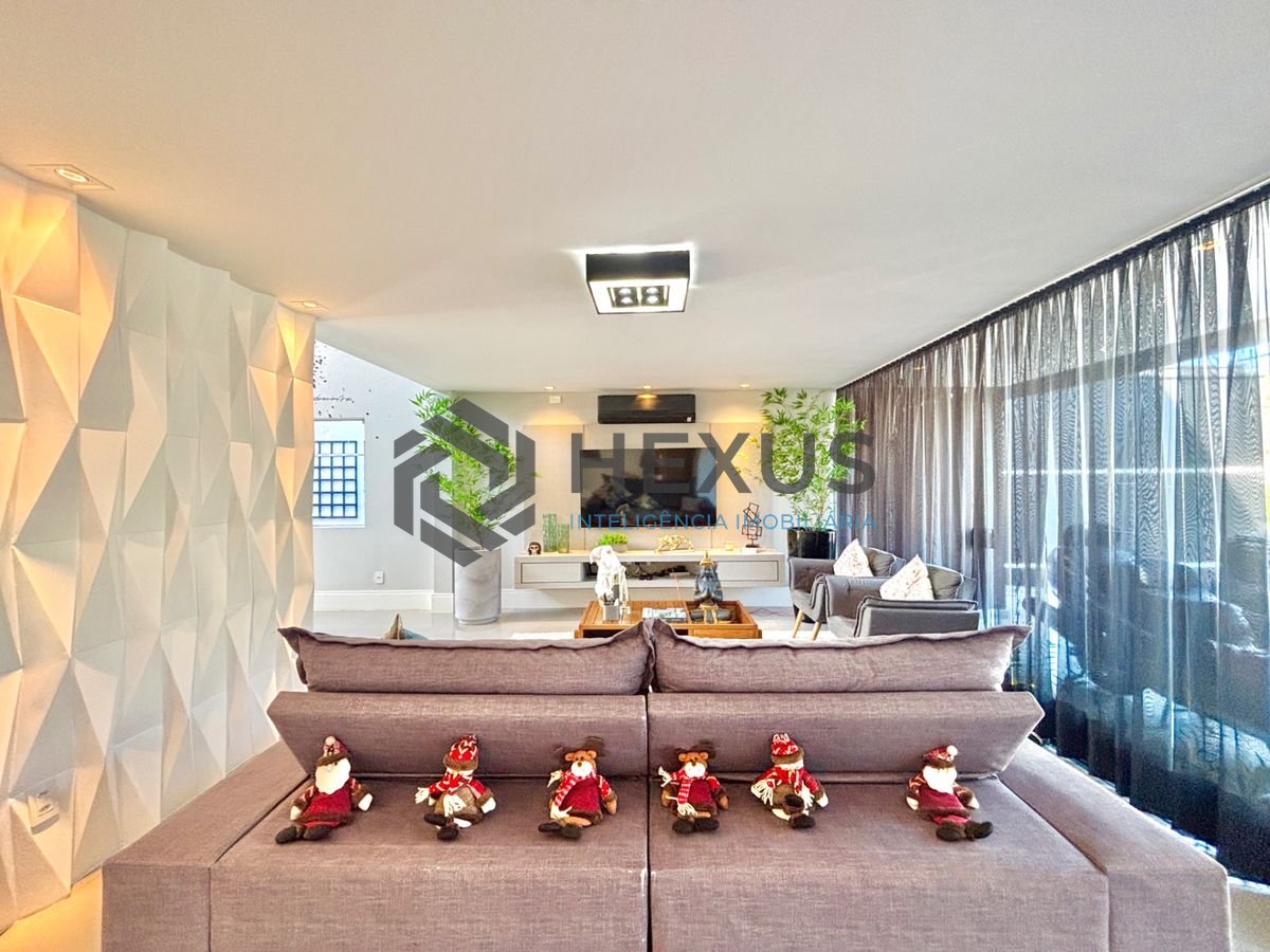 Foto 4 de Casa reformada com piscina e área gourmet no Jardim Acapulco, Guarujá