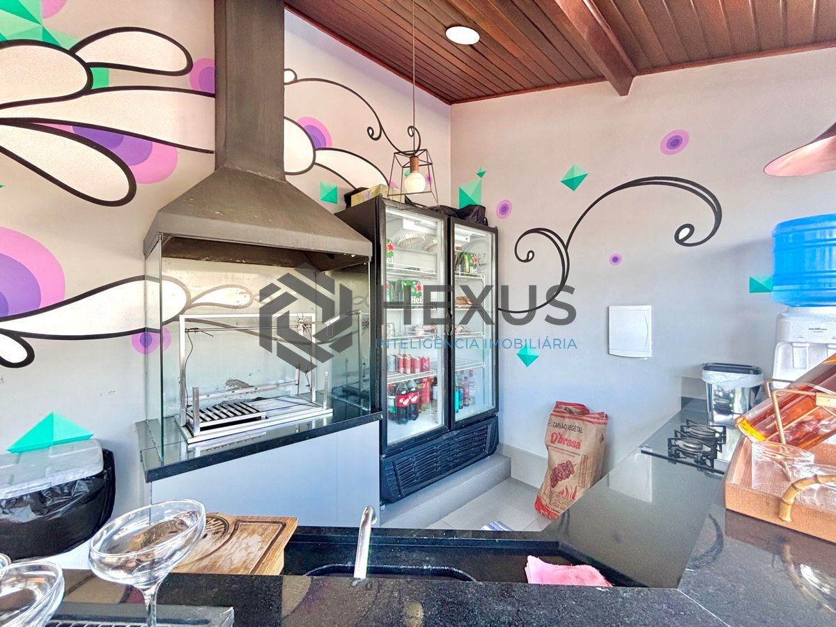 Foto 14 de Casa reformada com piscina e área gourmet no Jardim Acapulco, Guarujá