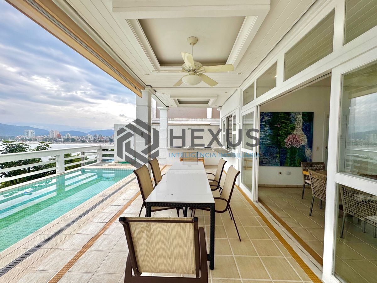 Foto 6 de Casa frente mar com piscina e área gourmet no Condomínio Península na Praia da Enseada, Guaruja