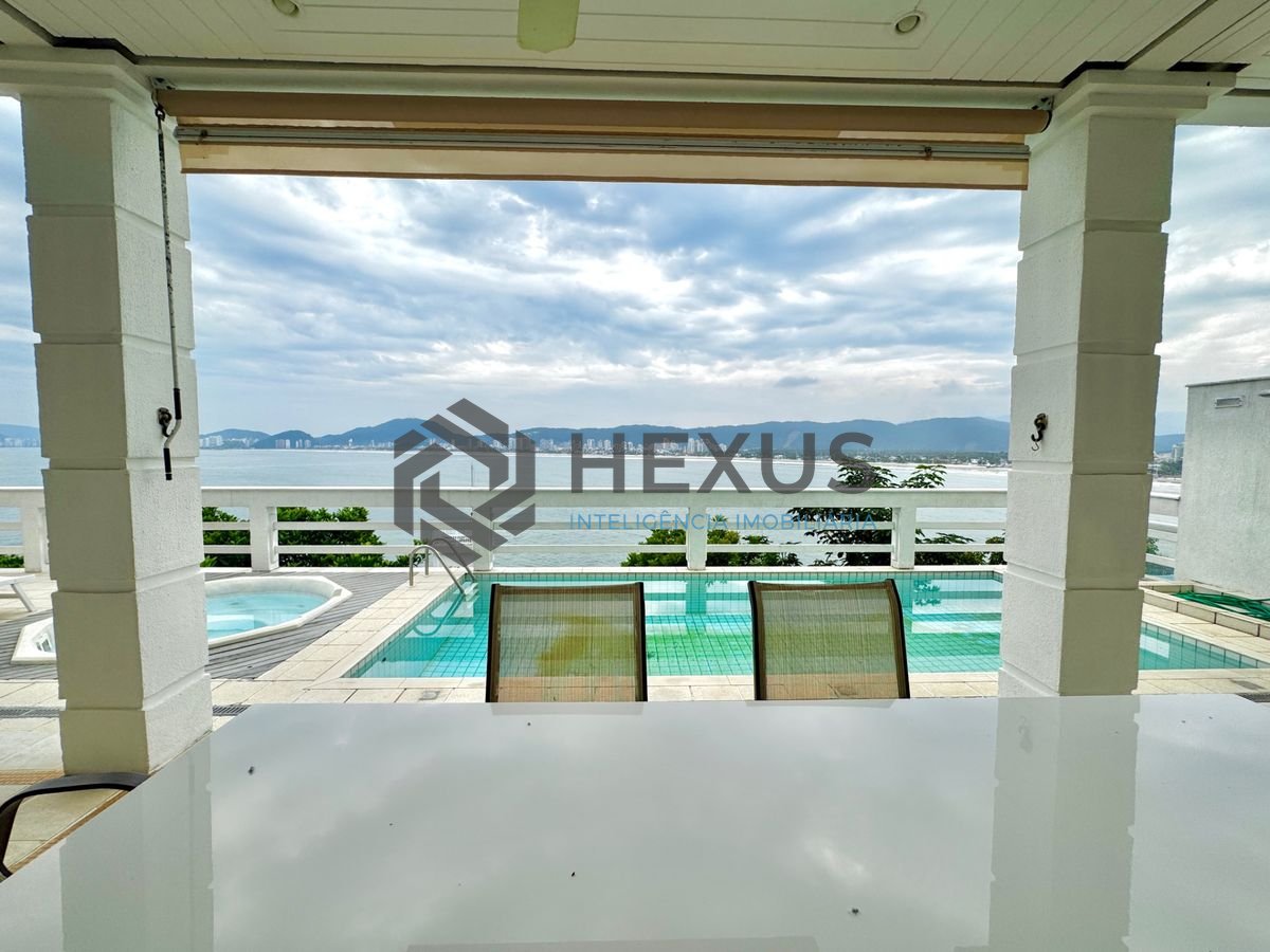 Foto 8 de Casa frente mar com piscina e área gourmet no Condomínio Península na Praia da Enseada, Guaruja