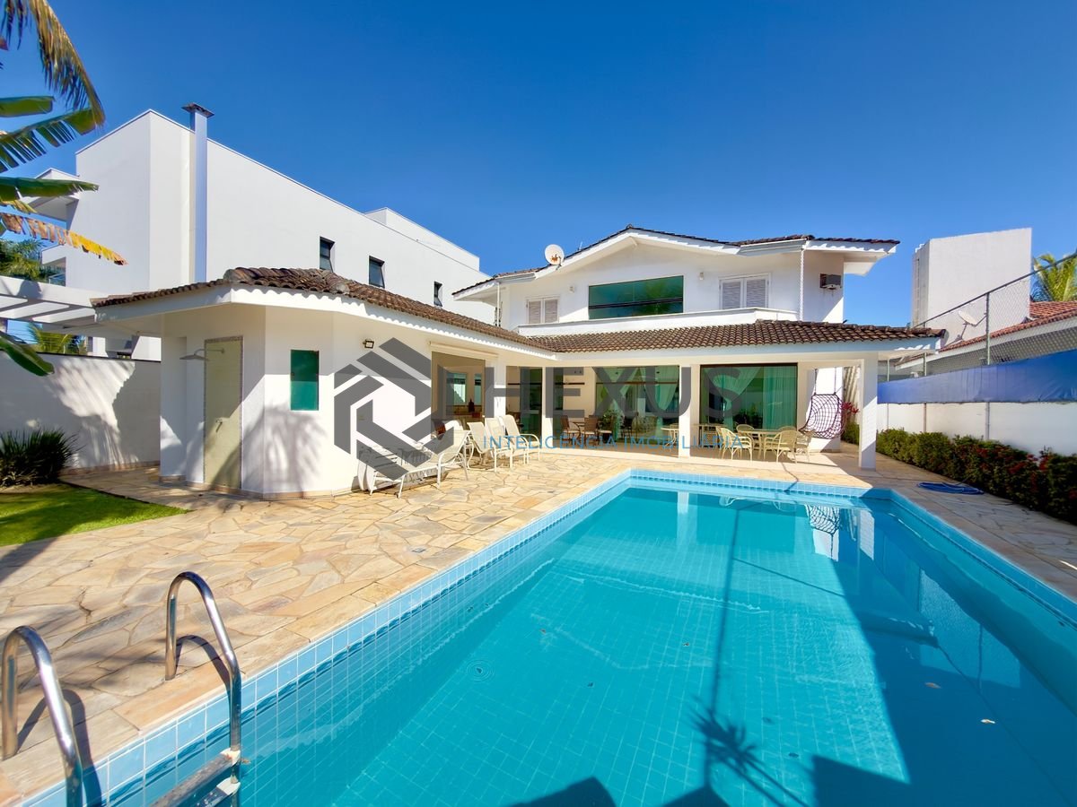 Foto 4 de Casa reformada com piscina e área gourmet no Jardim Acapulco, Guarujá