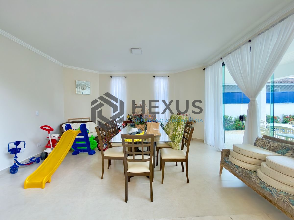 Foto 8 de Casa reformada com piscina e área gourmet no Jardim Acapulco, Guarujá
