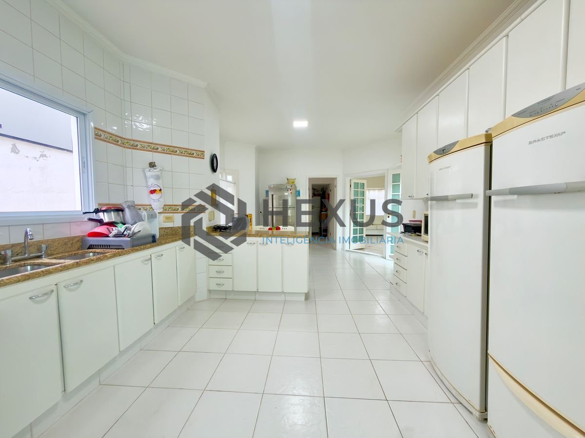 Foto 12 de Casa reformada com piscina e área gourmet no Jardim Acapulco, Guarujá