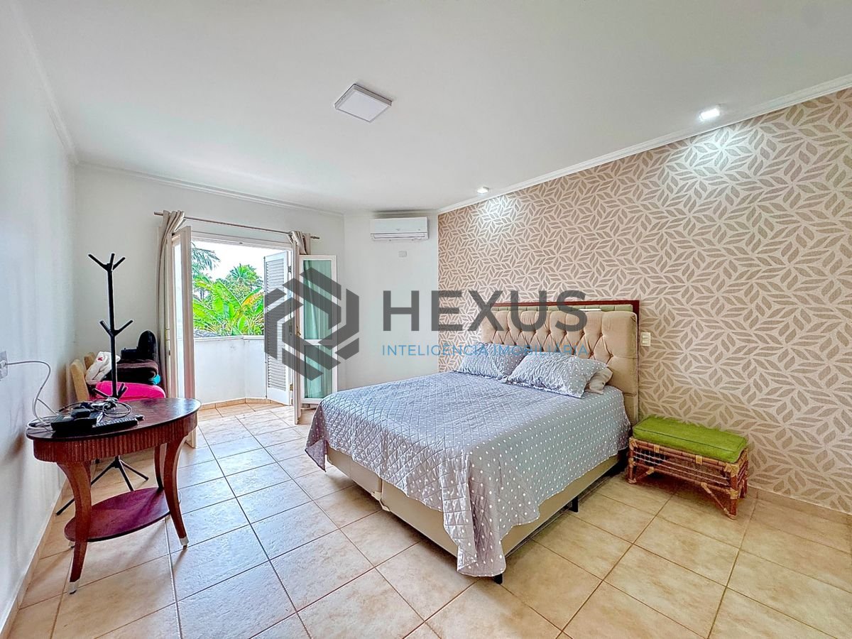 Foto 14 de Casa reformada com piscina e área gourmet no Jardim Acapulco, Guarujá