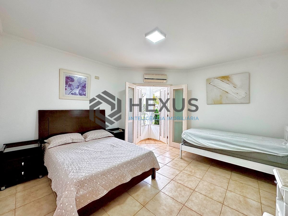 Foto 22 de Casa reformada com piscina e área gourmet no Jardim Acapulco, Guarujá