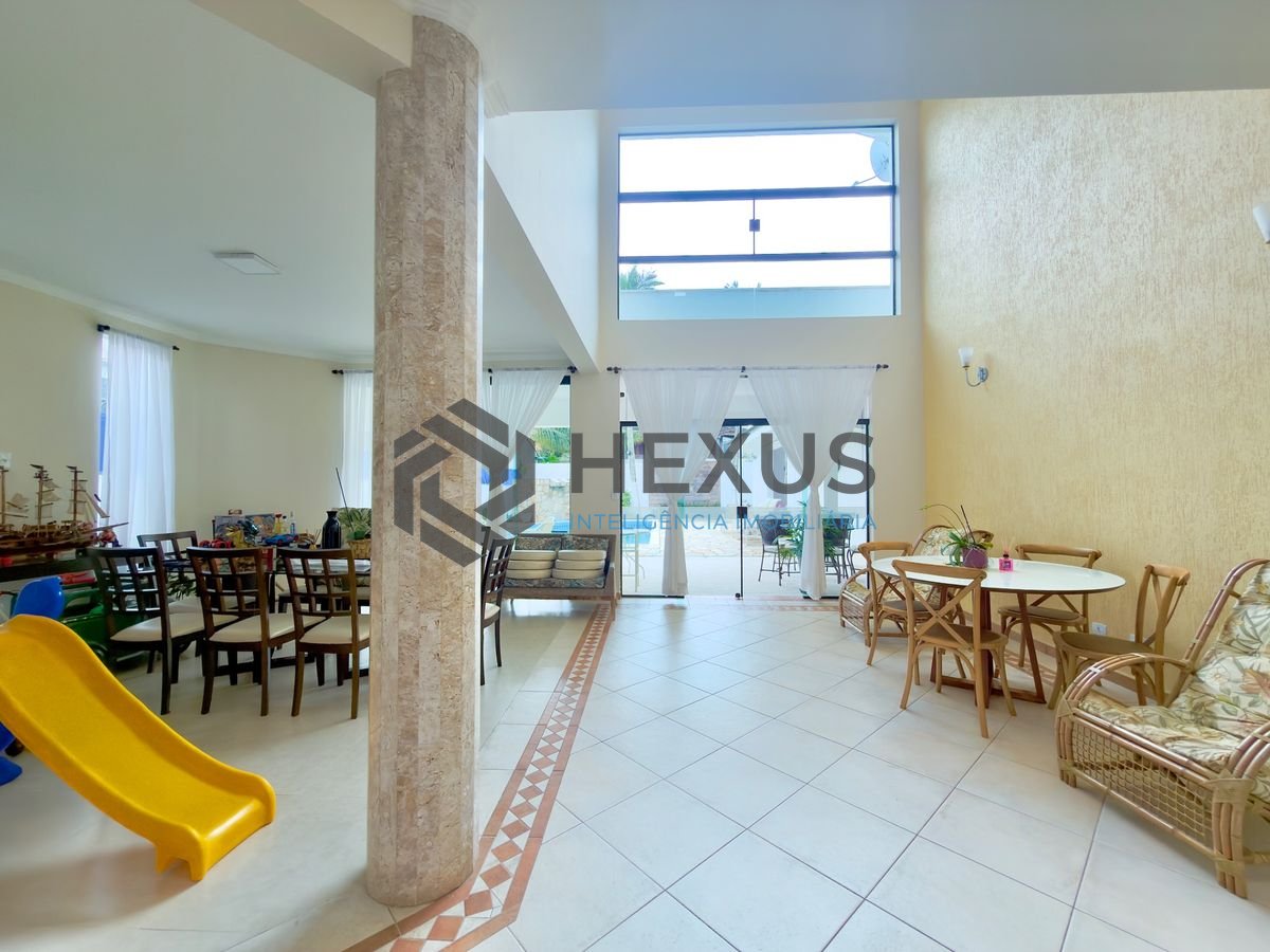 Foto 9 de Casa reformada com piscina e área gourmet no Jardim Acapulco, Guarujá