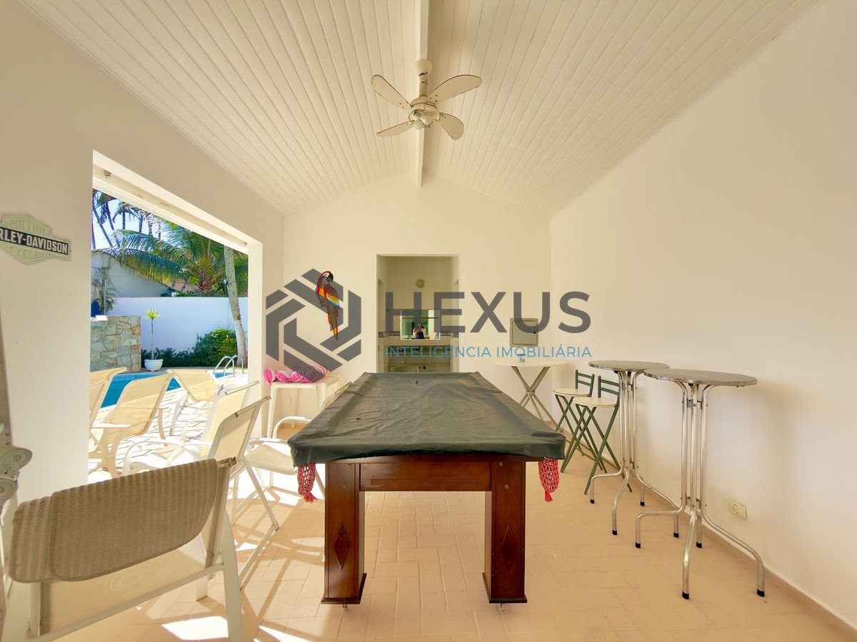 Foto 5 de Casa reformada com piscina e área gourmet no Jardim Acapulco, Guarujá