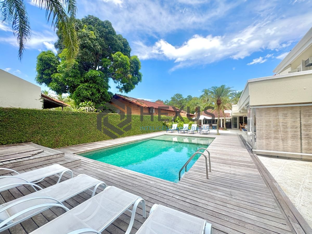 Foto 2 de Casa reformada com piscina e área gourmet no Jardim Acapulco, Guarujá