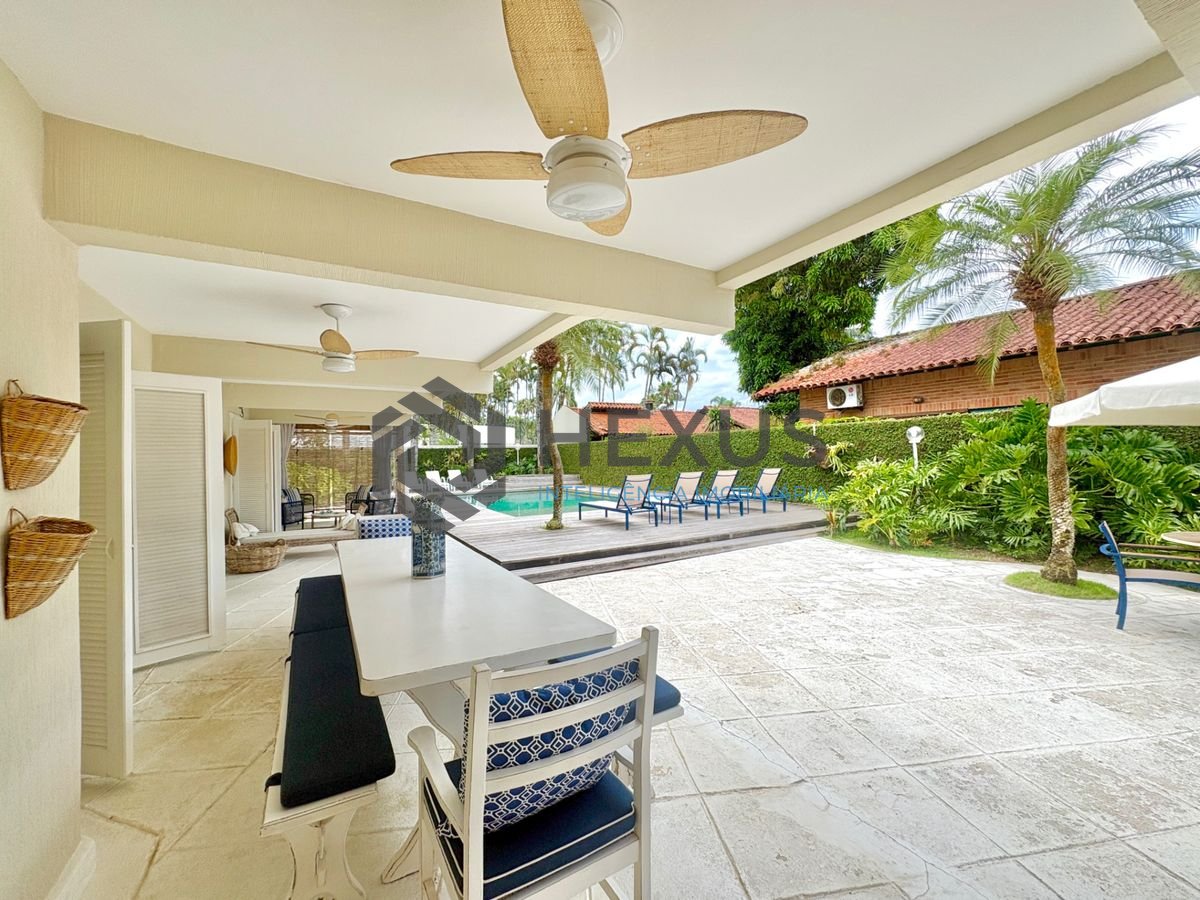 Foto 17 de Casa reformada com piscina e área gourmet no Jardim Acapulco, Guarujá
