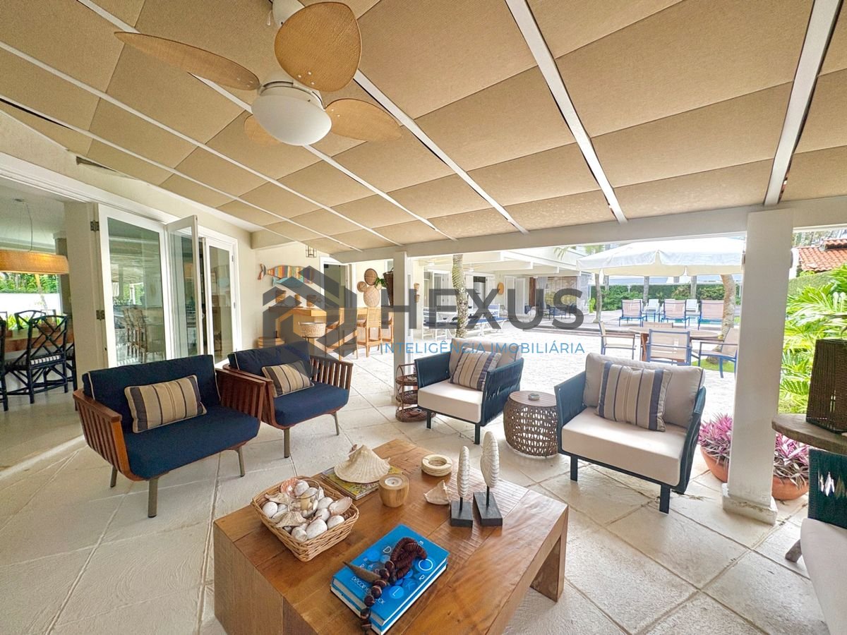 Foto 4 de Casa reformada com piscina e área gourmet no Jardim Acapulco, Guarujá