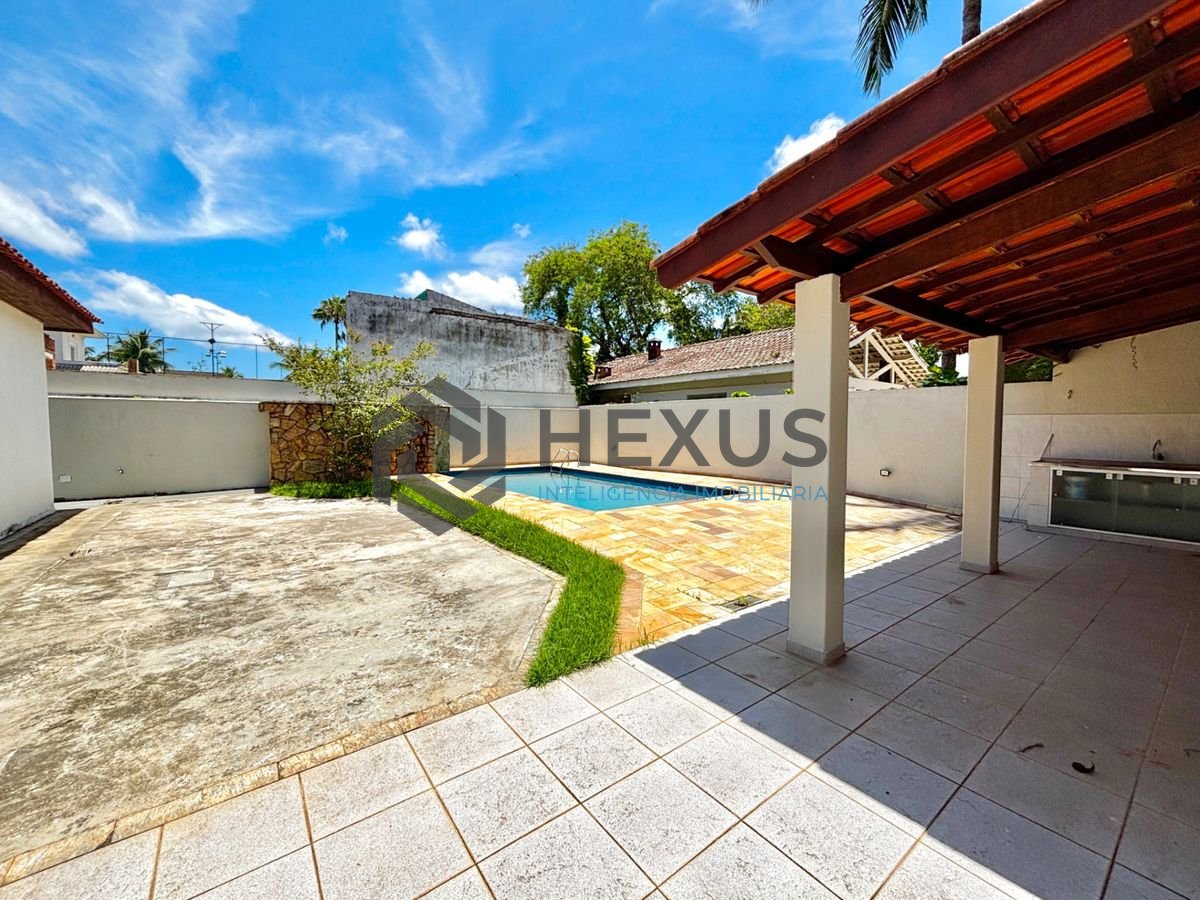 Foto 5 de Casa reformada com piscina e área gourmet no Jardim Acapulco, Guarujá