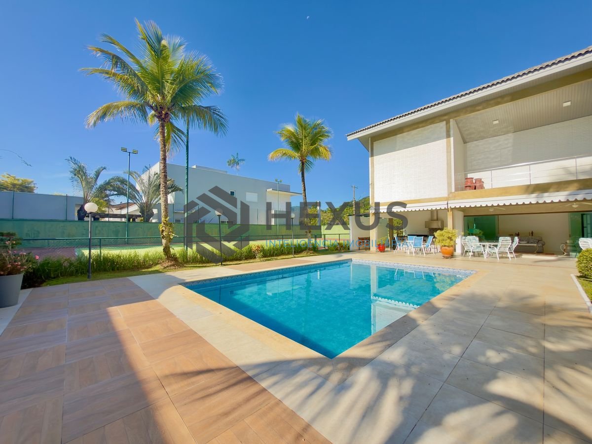 Foto 3 de Casa de alto padrão com piscina e área gourmet no Jardim Acapulco, Guarujá