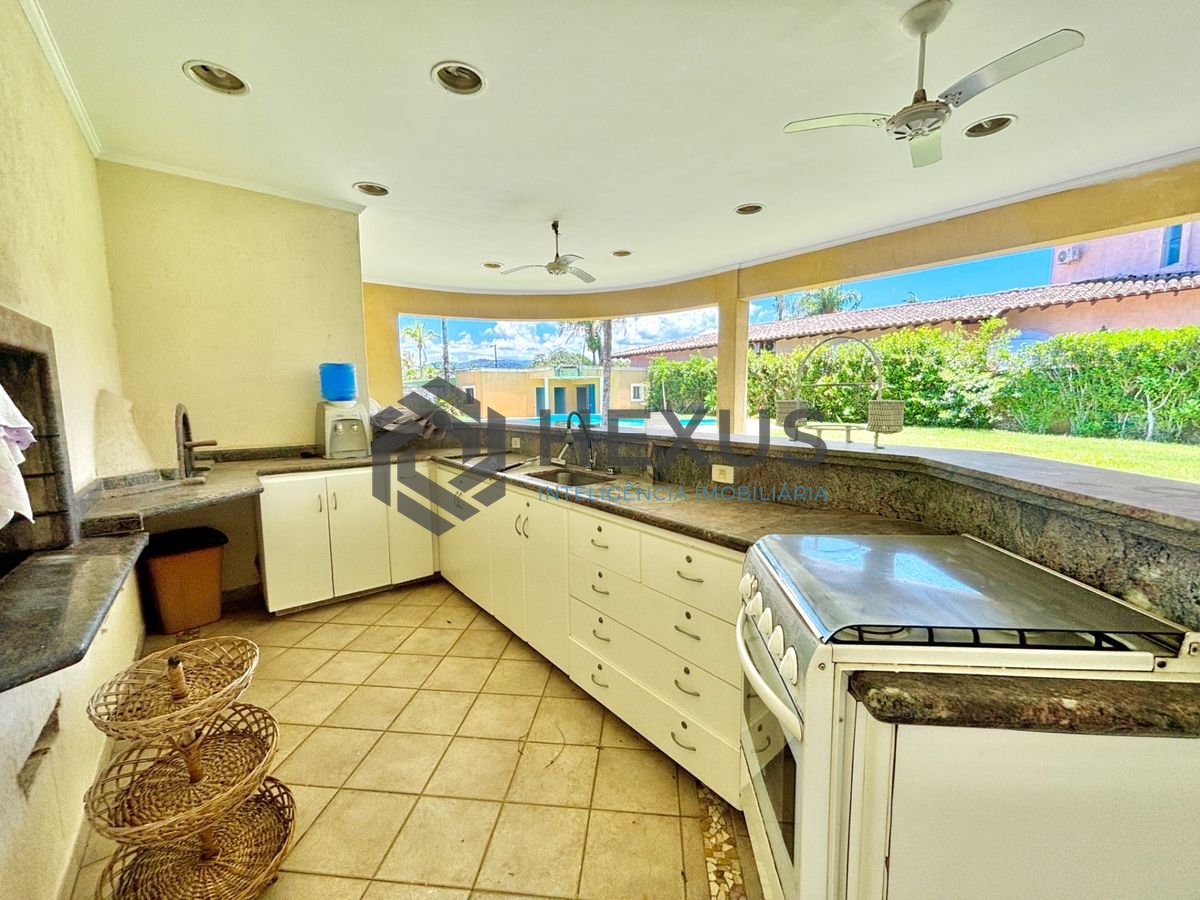 Foto 8 de Casa reformada com piscina e área gourmet no Jardim Acapulco, Guarujá