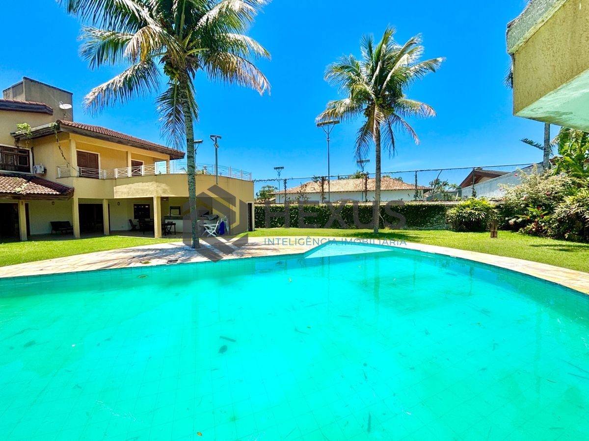 Foto 4 de Casa reformada com piscina e área gourmet no Jardim Acapulco, Guarujá