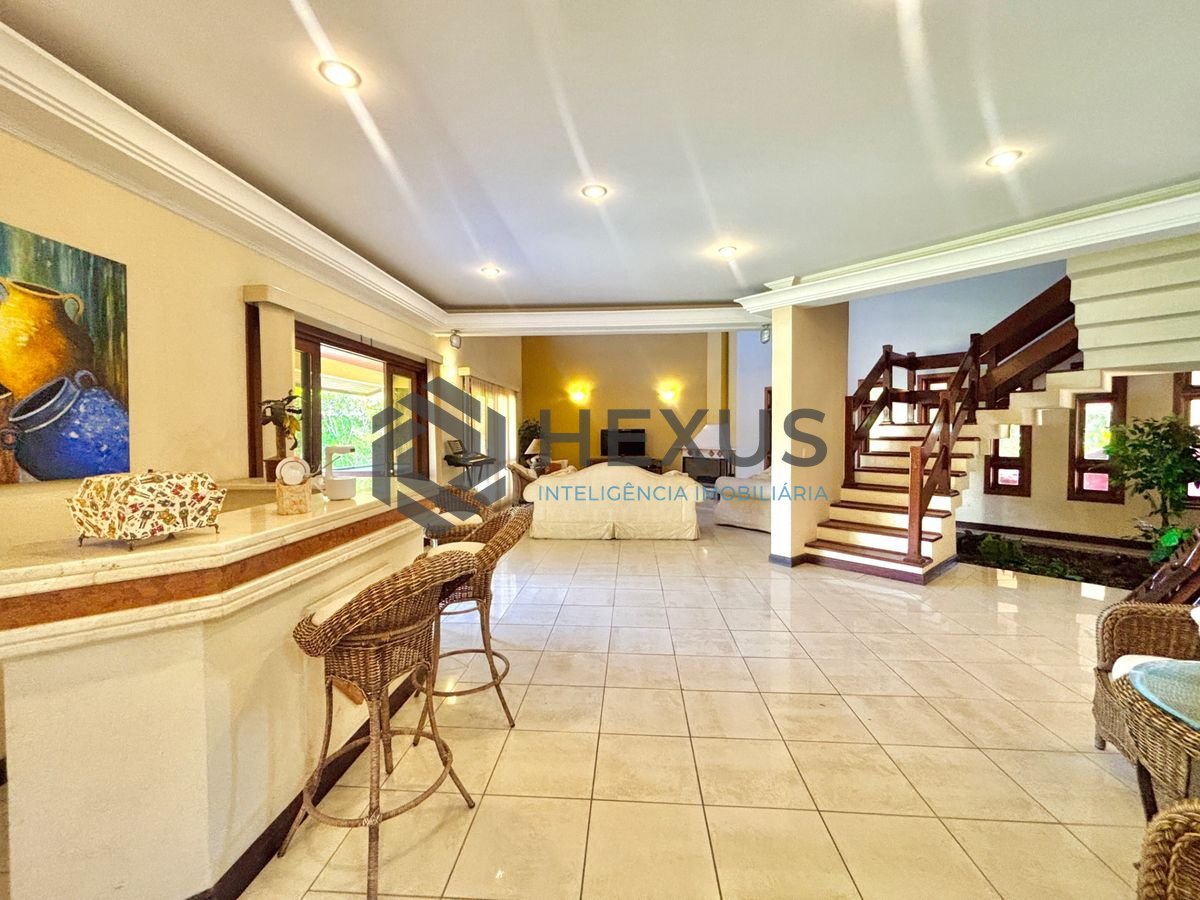 Foto 9 de Casa reformada com piscina e área gourmet no Jardim Acapulco, Guarujá
