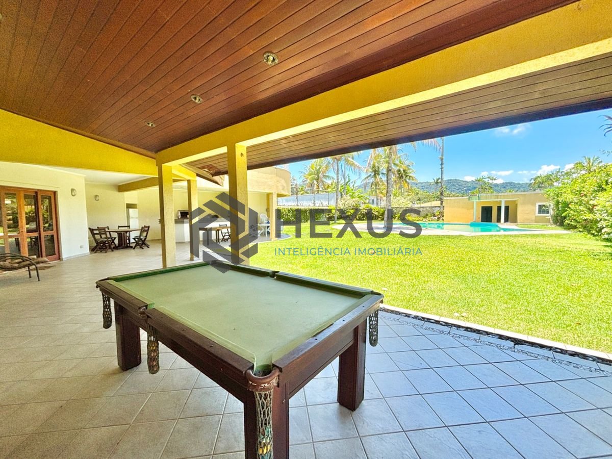Foto 6 de Casa reformada com piscina e área gourmet no Jardim Acapulco, Guarujá