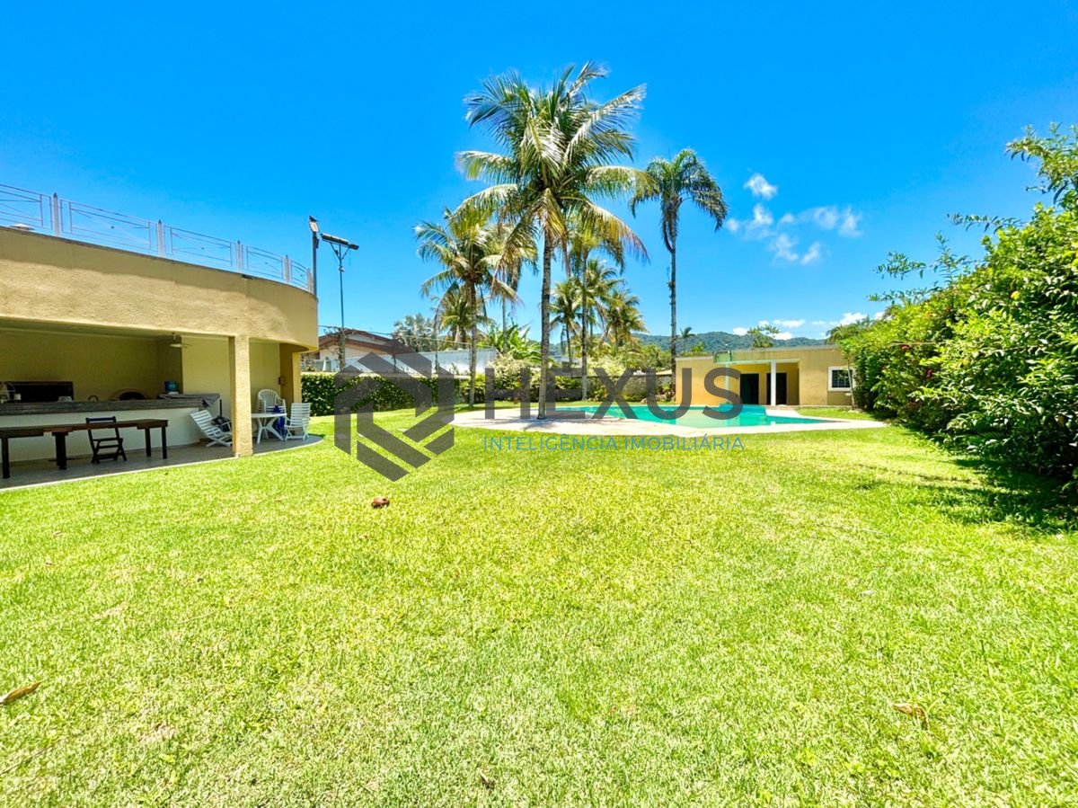 Foto 5 de Casa reformada com piscina e área gourmet no Jardim Acapulco, Guarujá