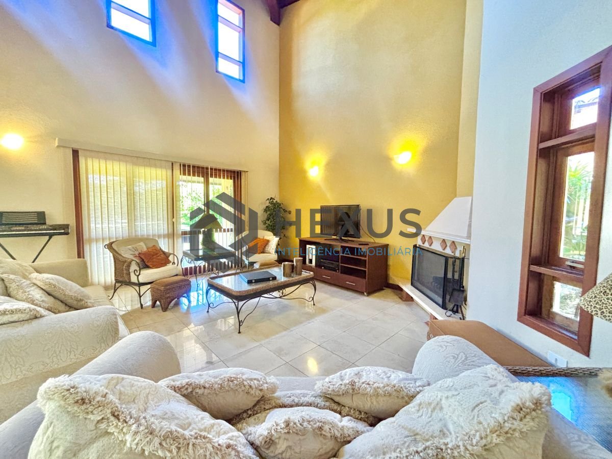 Foto 3 de Casa reformada com piscina e área gourmet no Jardim Acapulco, Guarujá