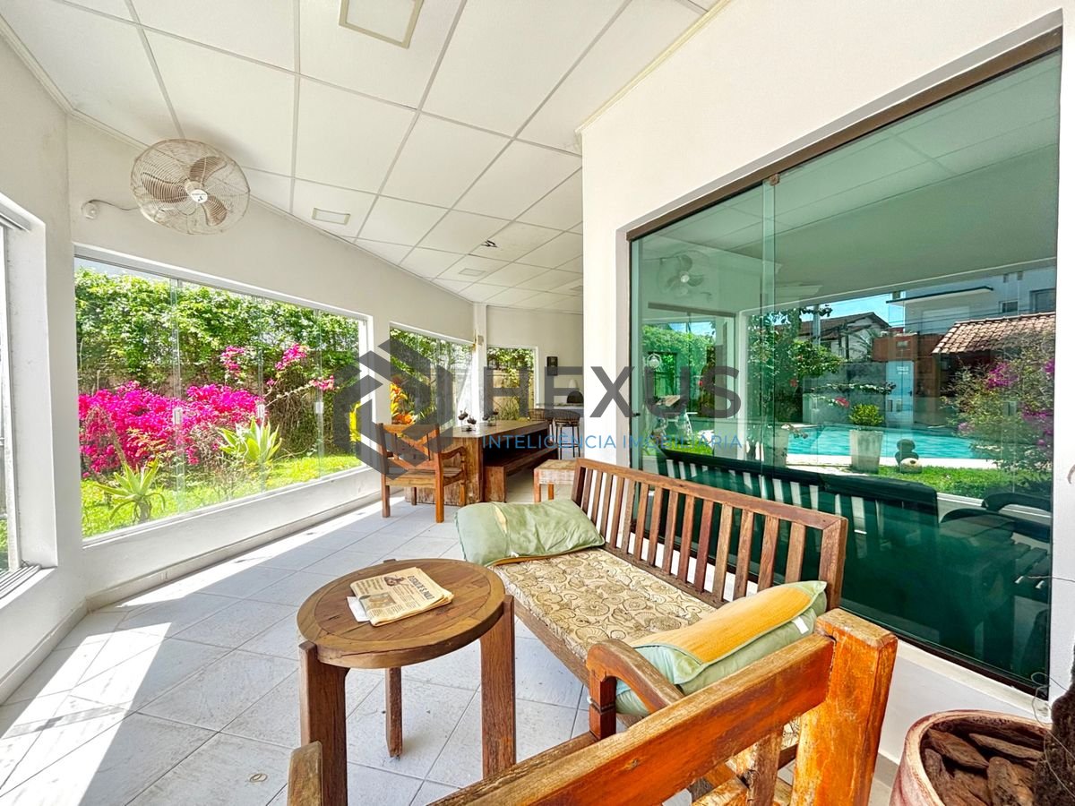 Foto 5 de Casa reformada com piscina e área gourmet no Jardim Acapulco, Guarujá